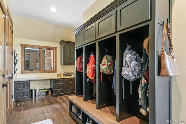 mudroom featuring dark tile patterned flooring and recessed lighting