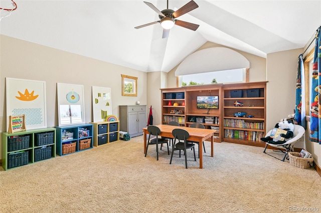 playroom featuring carpet, vaulted ceiling, and a ceiling fan