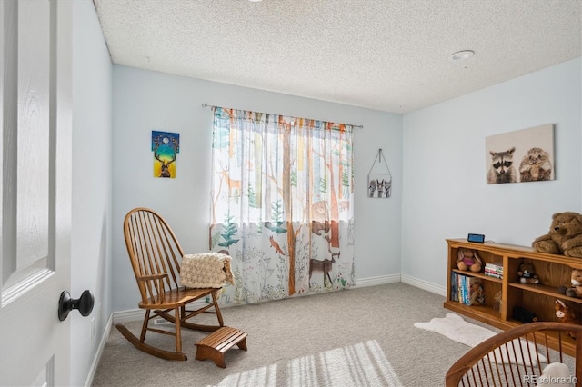 living area featuring a textured ceiling and carpet flooring