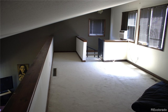 interior space featuring lofted ceiling