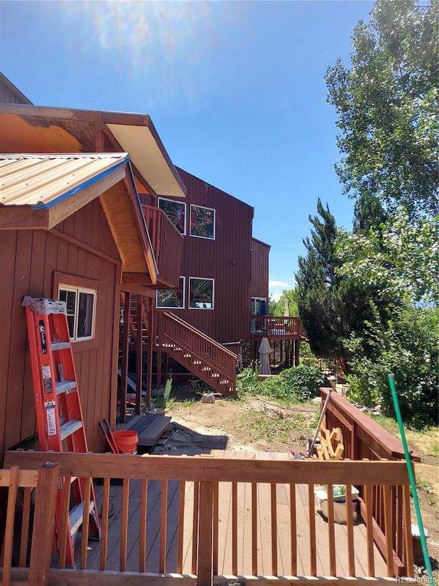 exterior space featuring a wooden deck