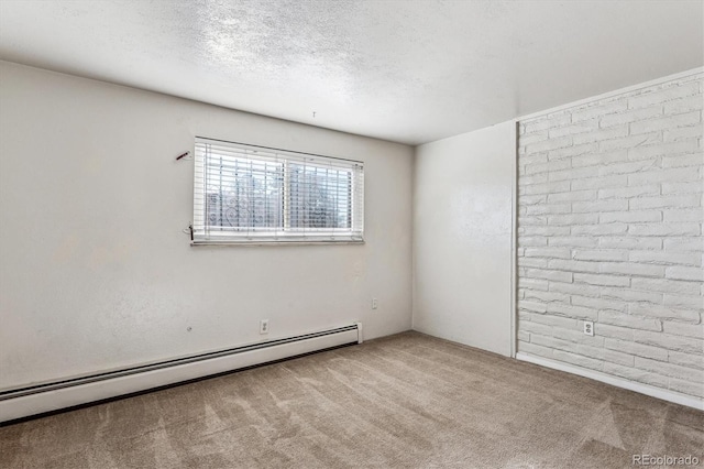 spare room with light carpet, a textured ceiling, and baseboard heating