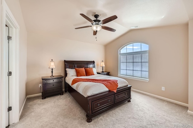 carpeted bedroom with lofted ceiling and ceiling fan