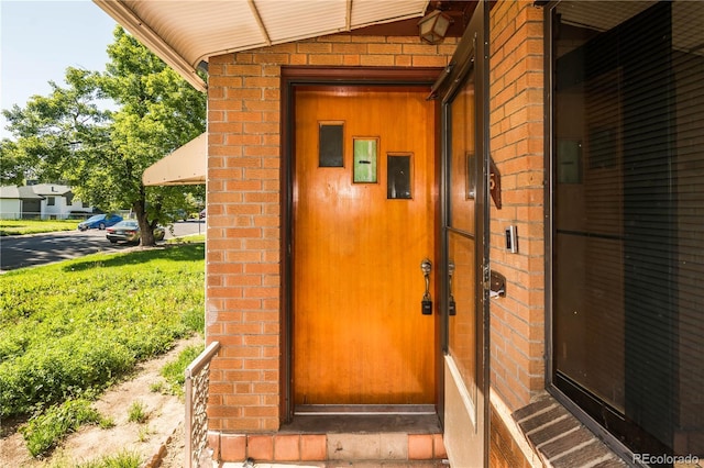 1195 Boston St, Aurora, CO 80010 - entrance to property featuring brick siding