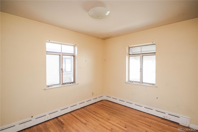 1195 Boston St, Aurora, CO 80010 - spare room featuring light wood-style floors