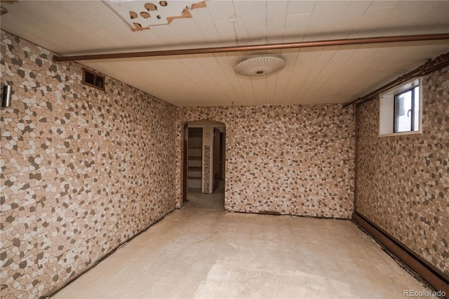 1195 Boston St, Aurora, CO 80010 - basement with arched walkways and light floors