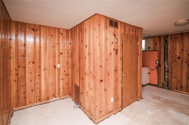 1195 Boston St, Aurora, CO 80010 - spare room featuring wooden walls