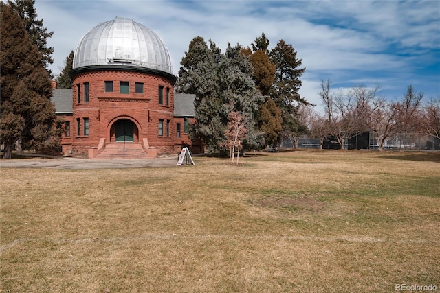 exterior space featuring a yard