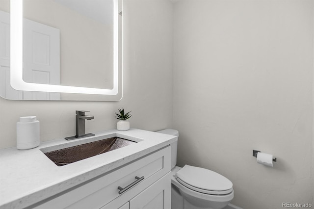 11241 E Cimmarron Dr, Englewood, CO 80111 - bathroom featuring vanity and toilet