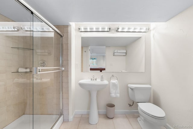 11241 E Cimmarron Dr, Englewood, CO 80111 - full bath featuring a shower stall and tile patterned floors