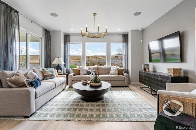 16498 W 92nd Pl, Arvada, CO 80007 - living area with a chandelier and wood finished floors