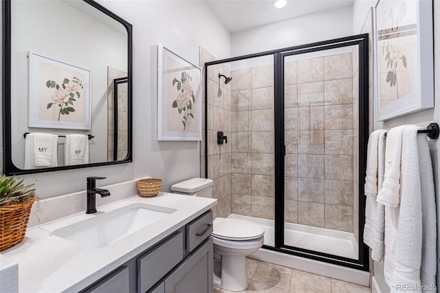 16498 W 92nd Pl, Arvada, CO 80007 - bathroom featuring vanity, a stall shower, and recessed lighting