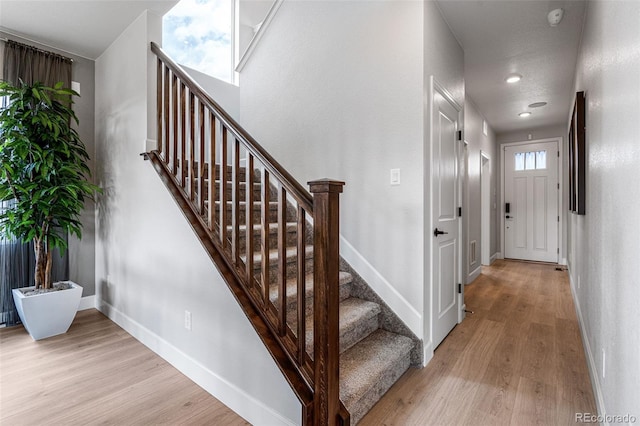 16498 W 92nd Pl, Arvada, CO 80007 - stairs with wood finished floors
