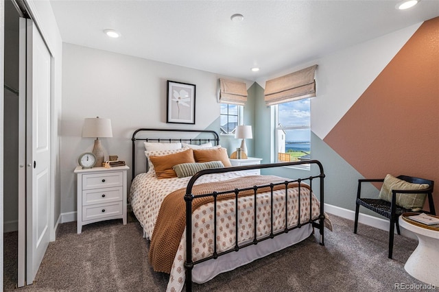 16498 W 92nd Pl, Arvada, CO 80007 - bedroom featuring dark carpet, a closet, and recessed lighting
