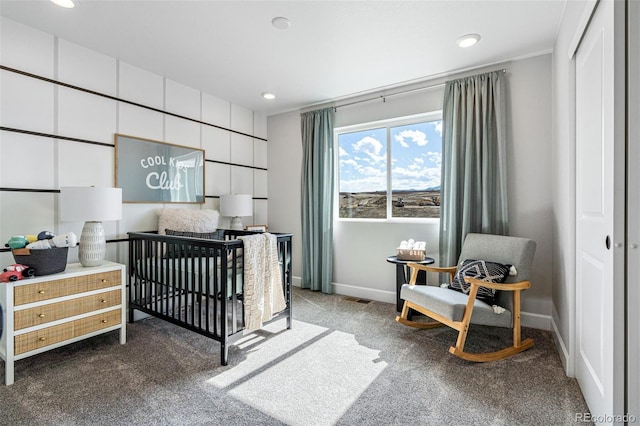 16498 W 92nd Pl, Arvada, CO 80007 - bedroom featuring dark carpet, recessed lighting, and a nursery area
