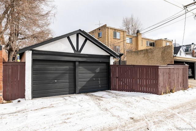 view of snow covered garage