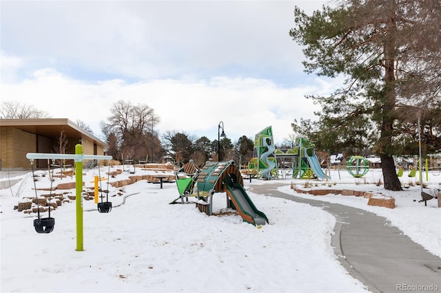 view of snow covered playground