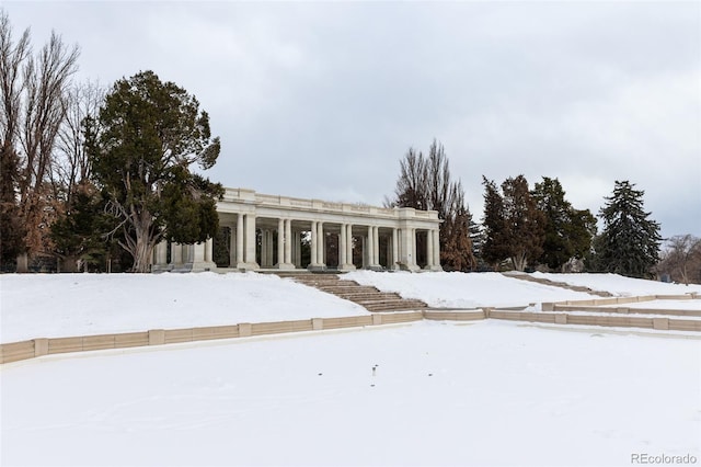 view of yard layered in snow