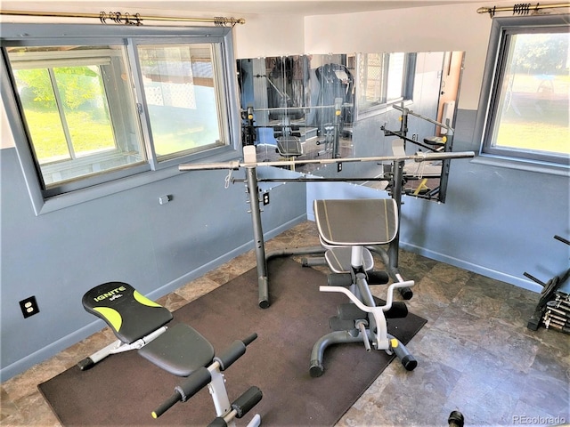 exercise area with baseboards
