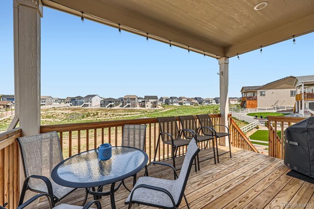 4536 Shady Path Ln, Castle Rock, CO 80104 - wooden deck featuring a residential view and a grill