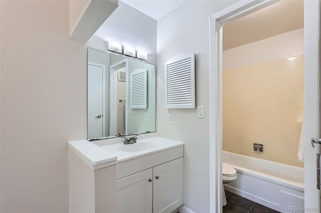 3550 S Harlan St Unit 177, Denver, CO 80235 - full bath with toilet, vanity, a bathtub, and tile patterned floors