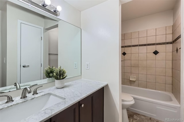 3550 S Harlan St Unit 177, Denver, CO 80235 - bathroom featuring toilet, vanity, and tile patterned flooring