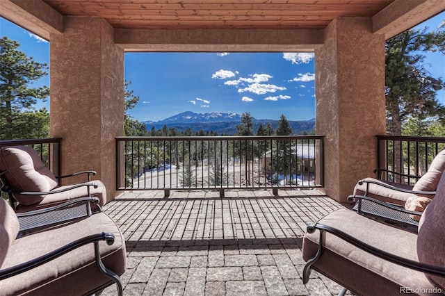 balcony featuring a mountain view