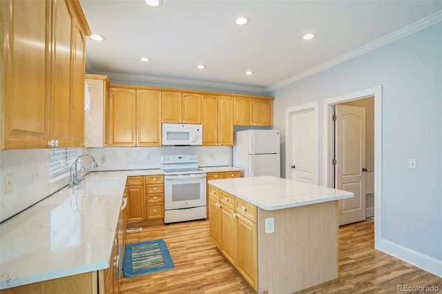 kitchen with white appliances, ornamental molding, light hardwood / wood-style floors, a kitchen island, and decorative backsplash