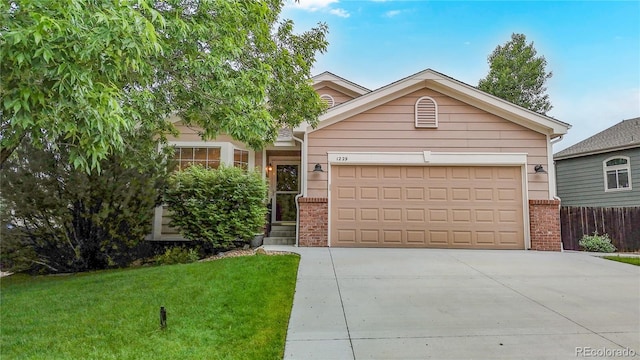 1229 Berganot Trl, Castle Pines, CO 80108 - view of front of home featuring brick siding, concrete driveway, and a garage