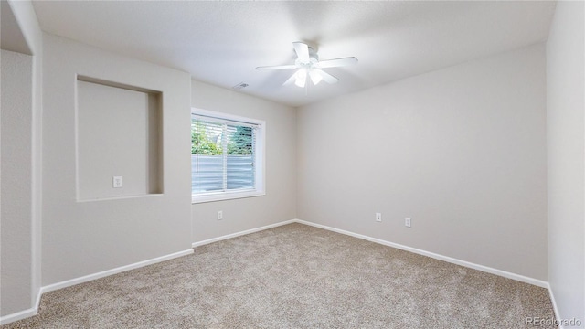 1229 Berganot Trl, Castle Pines, CO 80108 - carpeted spare room featuring ceiling fan and baseboards