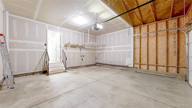 1229 Berganot Trl, Castle Pines, CO 80108 - garage featuring a garage door opener