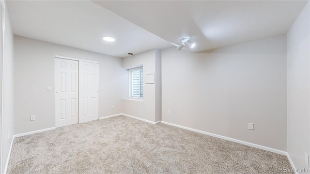 1229 Berganot Trl, Castle Pines, CO 80108 - basement featuring carpet floors and baseboards