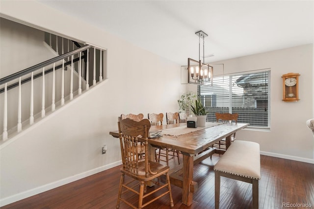 11885 Helena St, Commerce City, CO 80022 - dining space with dark hardwood / wood-style flooring and an inviting chandelier