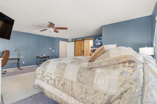 11885 Helena St, Commerce City, CO 80022 - bedroom featuring a barn door, carpet flooring, and ceiling fan