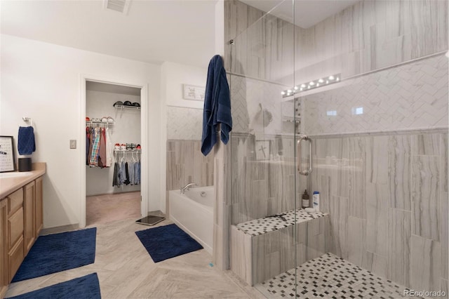 11885 Helena St, Commerce City, CO 80022 - bathroom with vanity and separate shower and tub