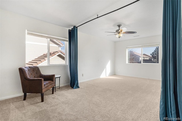 11885 Helena St, Commerce City, CO 80022 - living area featuring light colored carpet and ceiling fan