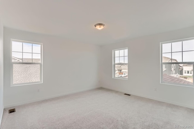 empty room with carpet flooring