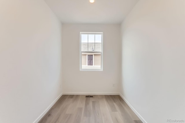 empty room featuring light hardwood / wood-style floors