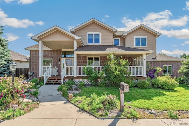 942 Xenon Ct, Golden, CO 80401 - view of front facade with a porch and brick siding