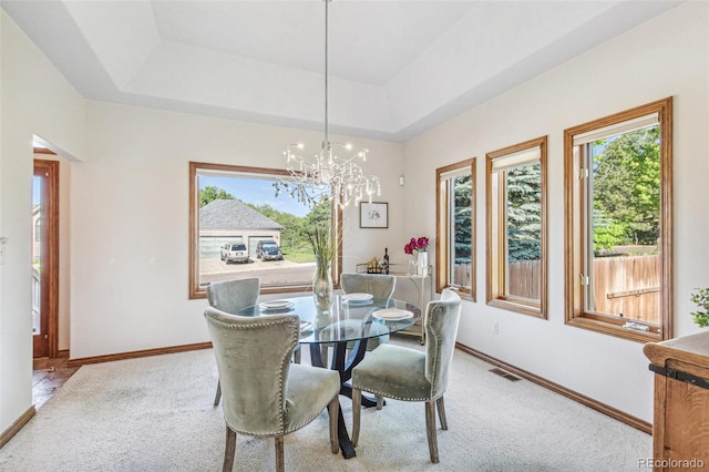 942 Xenon Ct, Golden, CO 80401 - carpeted dining space with plenty of natural light and a chandelier