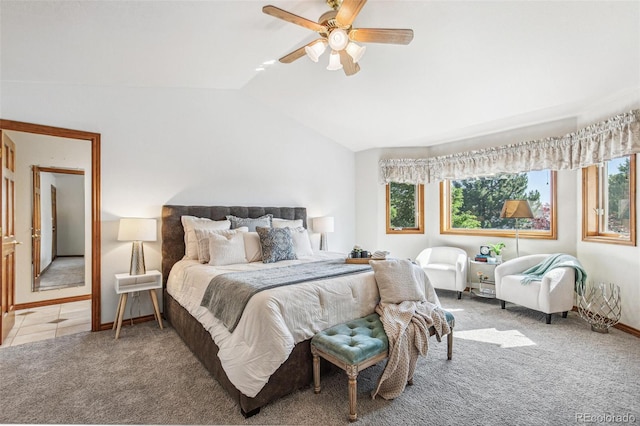 942 Xenon Ct, Golden, CO 80401 - bedroom featuring light colored carpet, multiple windows, lofted ceiling, and a ceiling fan