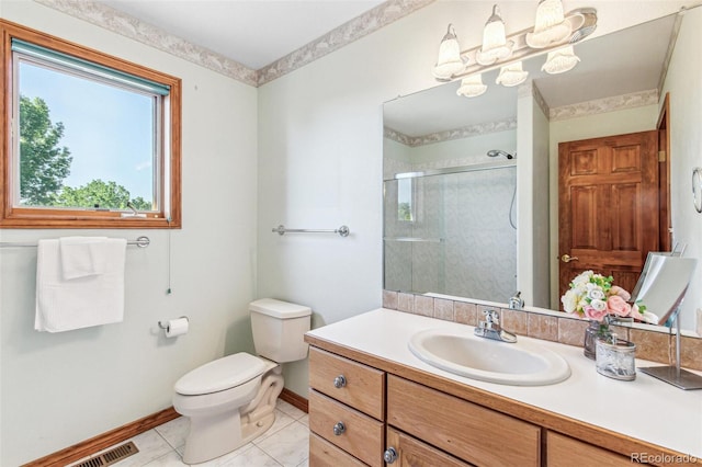 942 Xenon Ct, Golden, CO 80401 - full bathroom with vanity, a shower stall, and tile patterned flooring