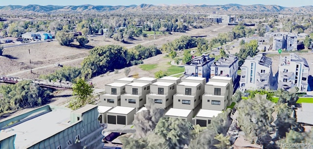 aerial view featuring a residential view and a mountain view