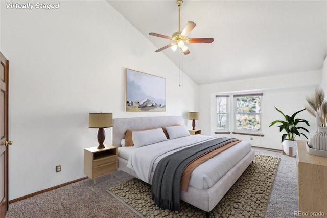 bedroom with high vaulted ceiling, carpet floors, baseboards, and a ceiling fan