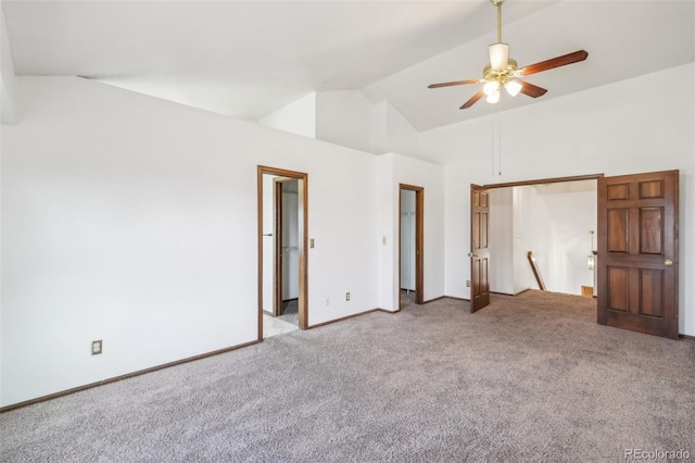 unfurnished bedroom with a ceiling fan, carpet flooring, high vaulted ceiling, and baseboards