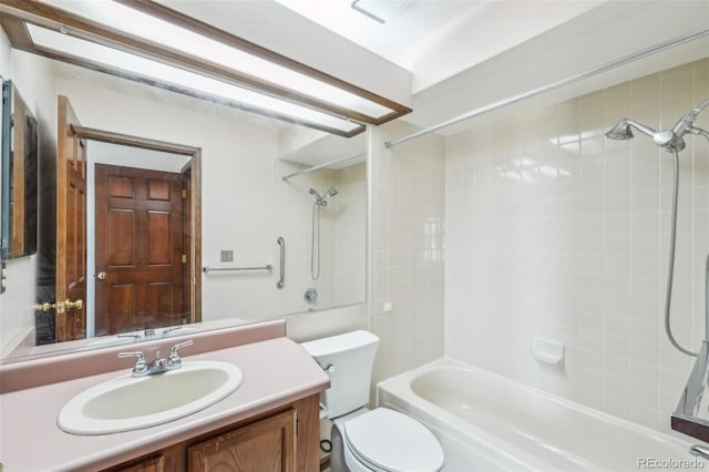 full bath with toilet, bathtub / shower combination, and vanity