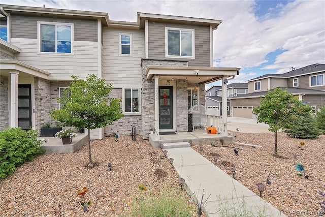 view of front of home with a garage