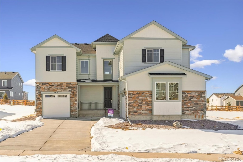 view of front of property featuring a garage