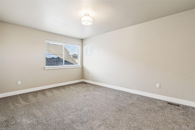 view of carpeted spare room