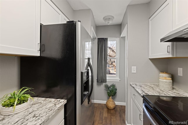 kitchen with light stone countertops, stainless steel fridge with ice dispenser, black electric range, dark hardwood / wood-style floors, and white cabinets